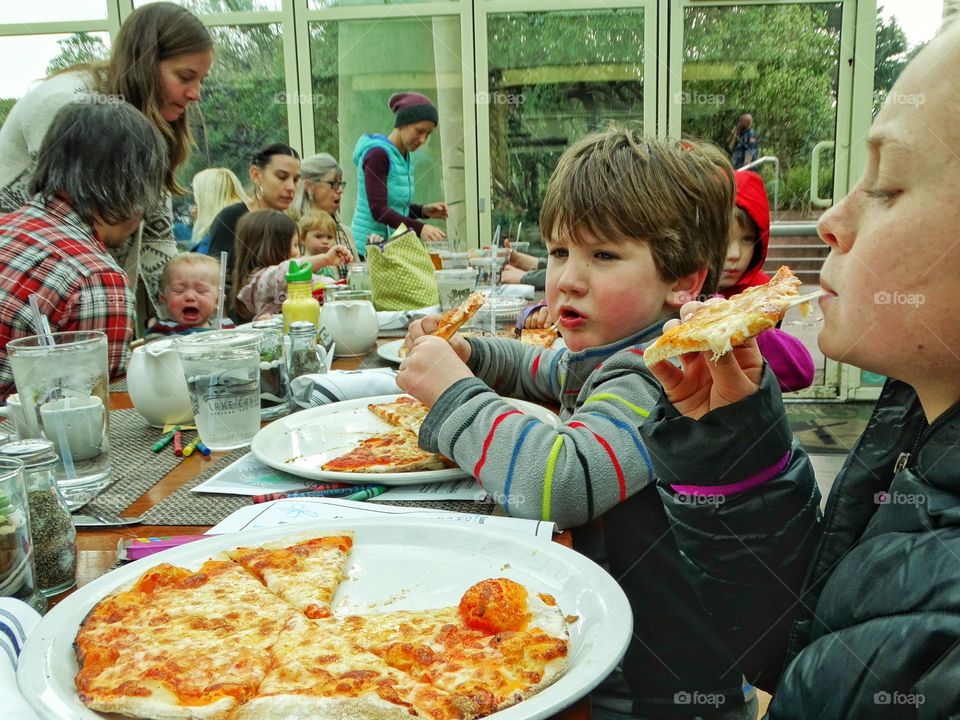 Family Eating Pizza
