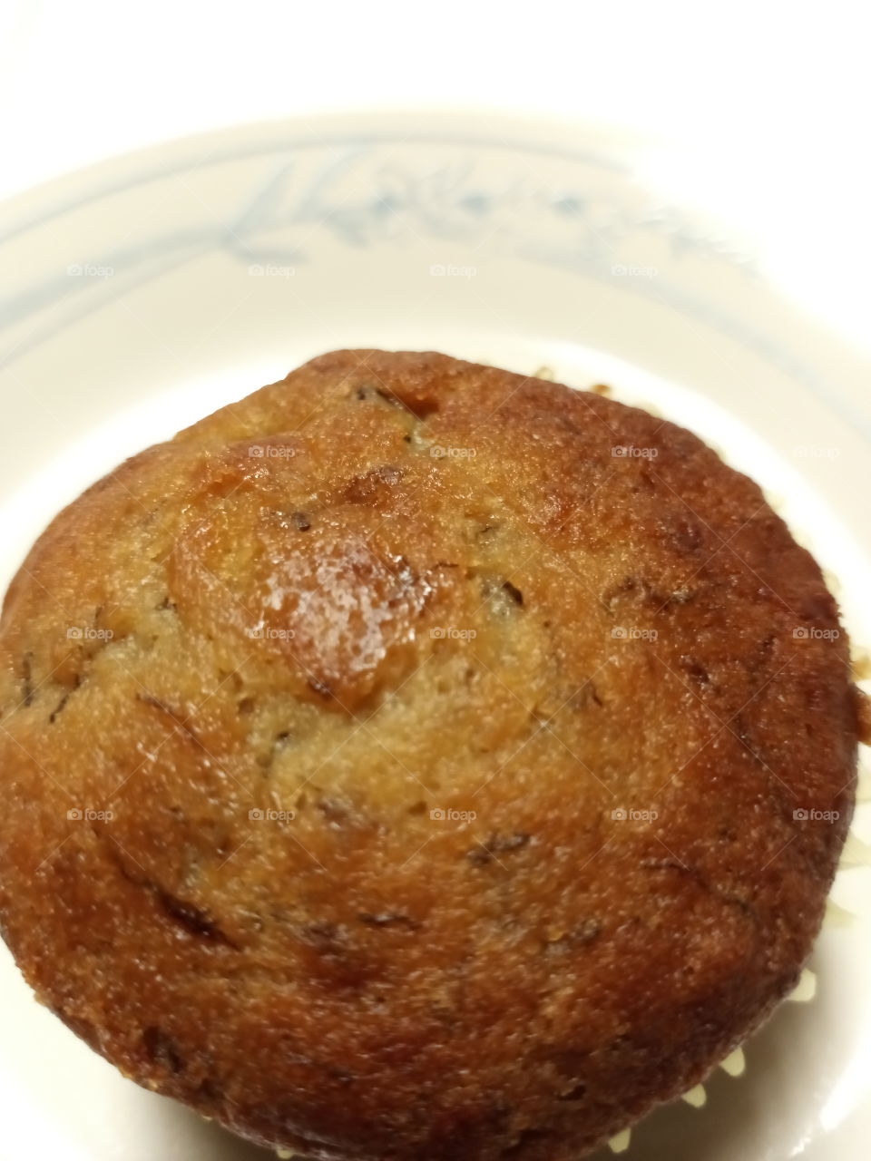 homemade banana muffin with raisins and cranberries.