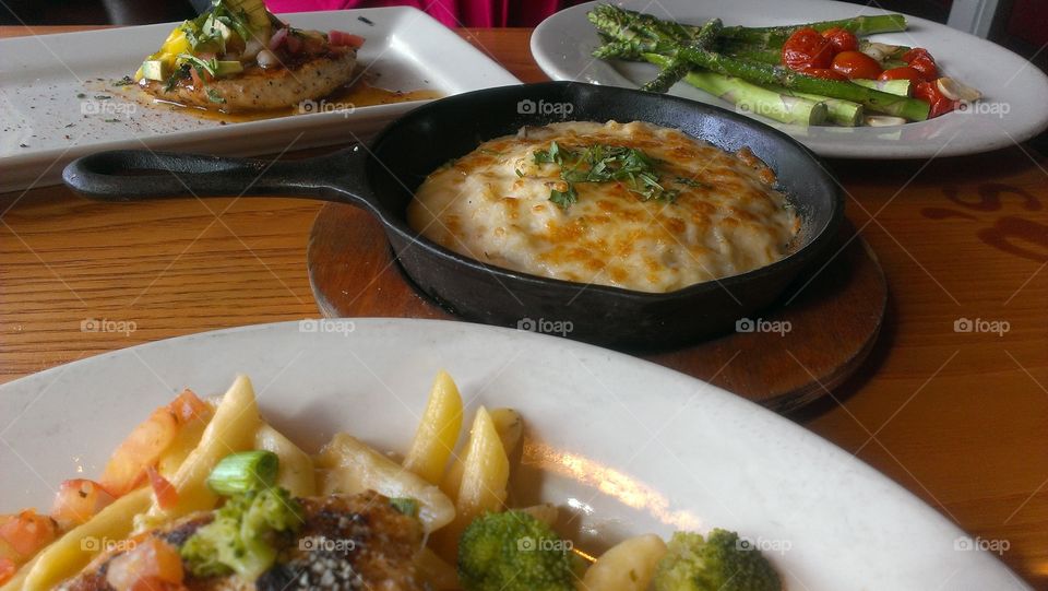 Dinner at Chili's. Cajun chicken pasta, mango-chili chicken, grilled asparagus, and skillet mashed potatoes. Dinner with my mom.
