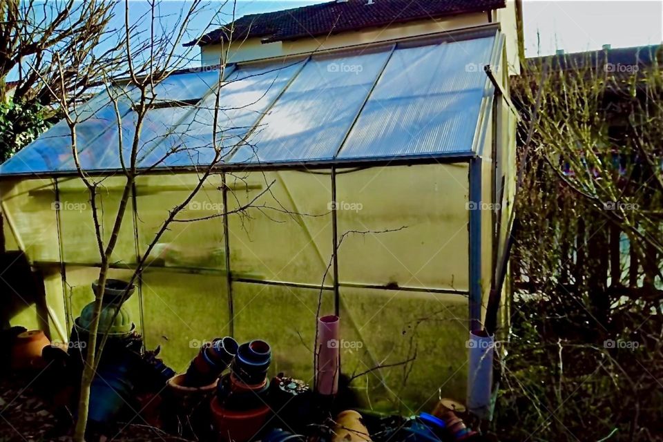 This is a greenhouse in rural „Bavaria“, Germany newly repaired and ready for this season’s planting and harvesting. 2024. Hypnotic Productions