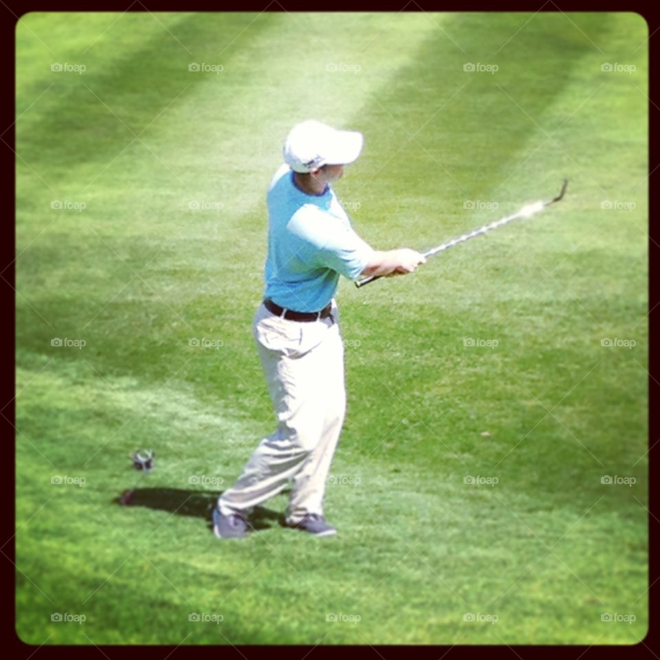 Golfer chipping a shot