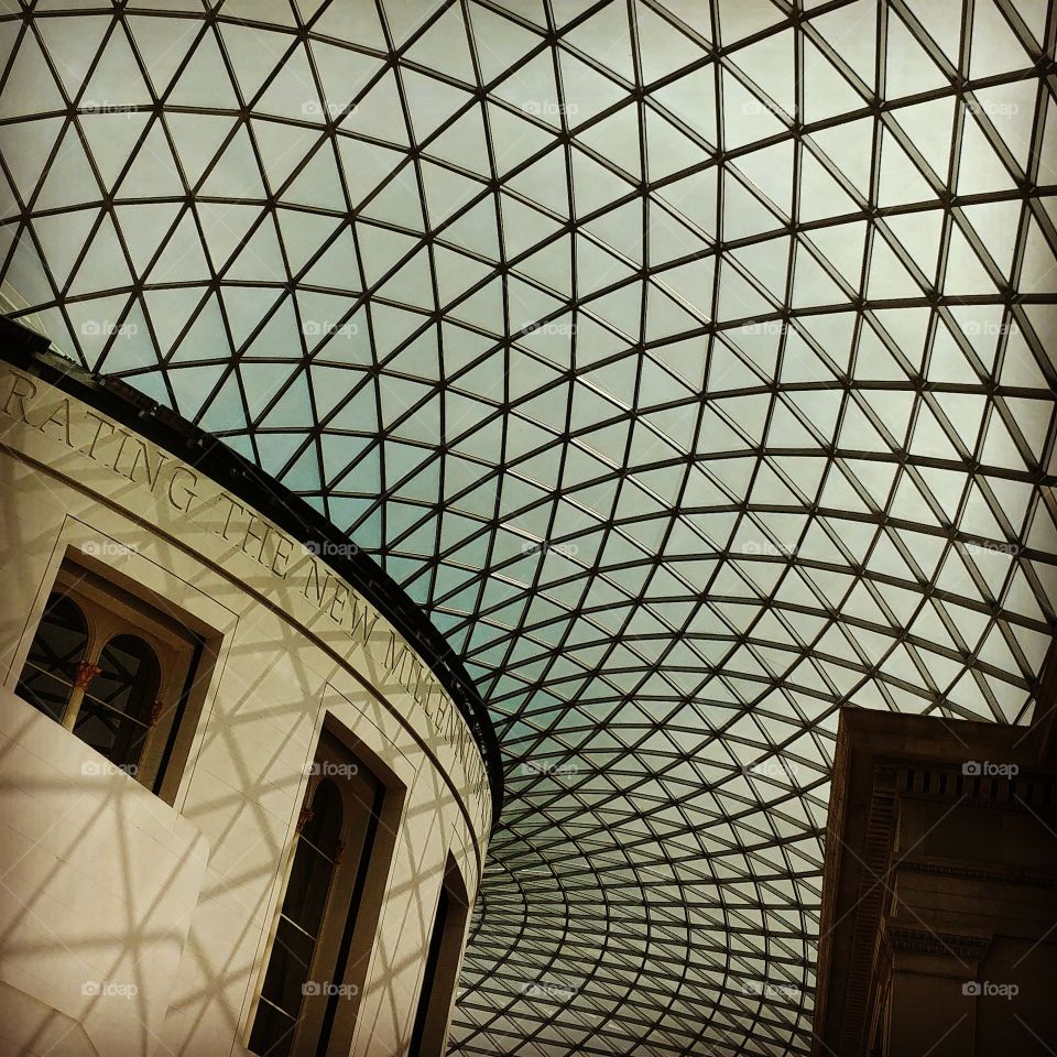 domed industrial glass ceiling casting shadows