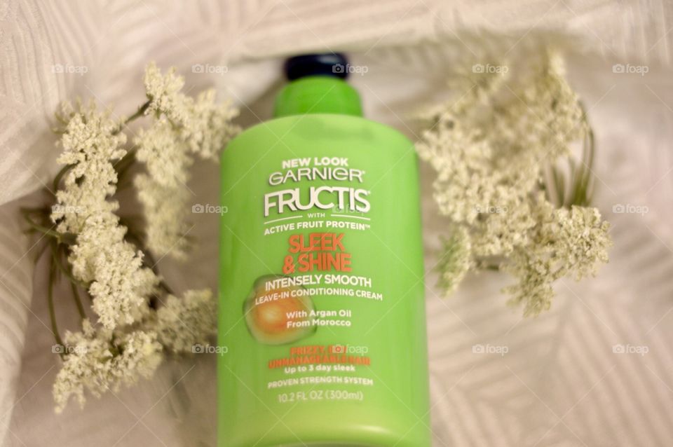 Garnier sleek and shine intensely smooth on a white background