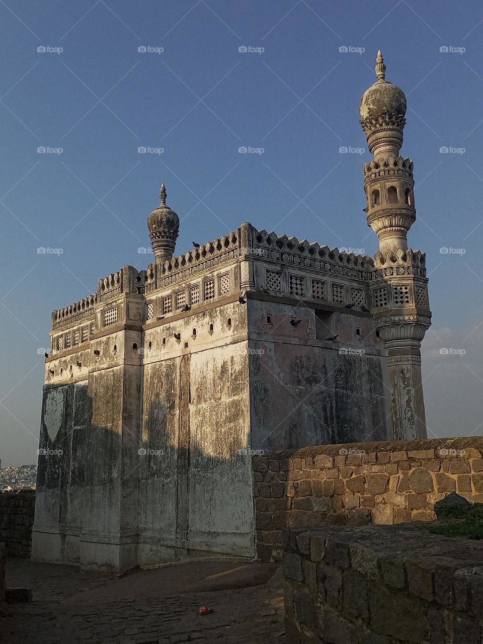 The Golconda fort in Hyderabad having this Mosque at the top of it.