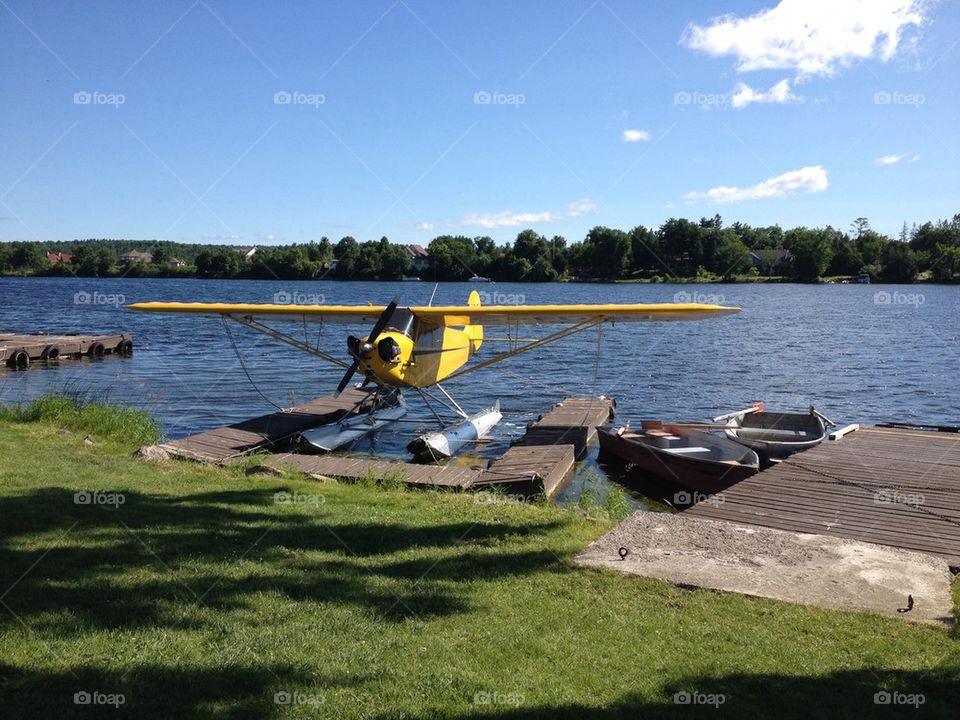 Small Float Plane At A Dock