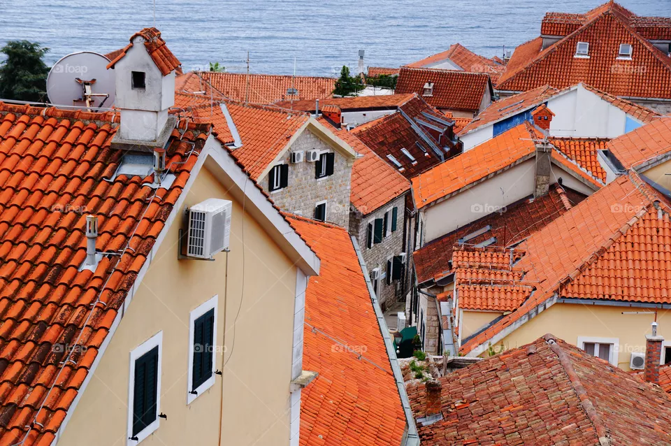 Orange terracotta roofs of old Mediterranean town houses