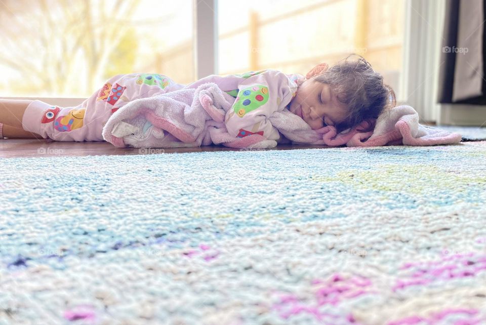 Toddler girl asleep on the floor, toddler sleeping on the floor, toddler crashes for nap, nap time for toddler girl, toddler girl takes a nap on the floor, toddler is super sleeepy