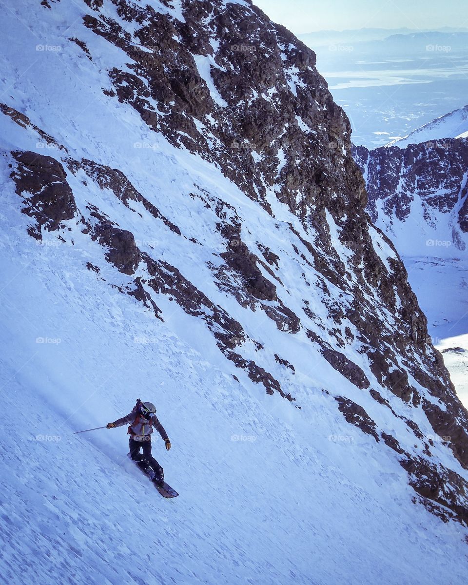 A steep descent in the Alaskan backcountry.