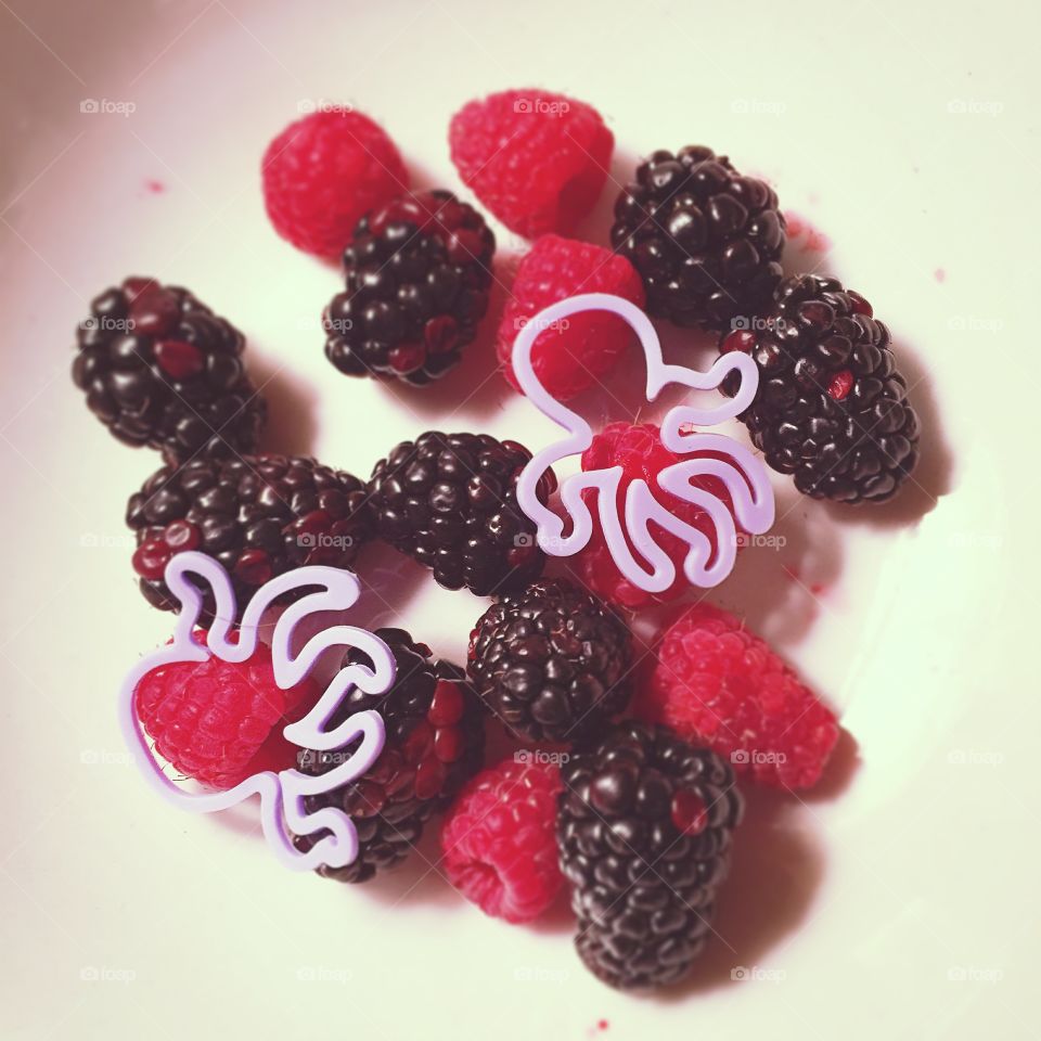 Octopus Berries . Trying to eat my breakfast when my nephew just wants to play with it. Too bad it makes for great art! 