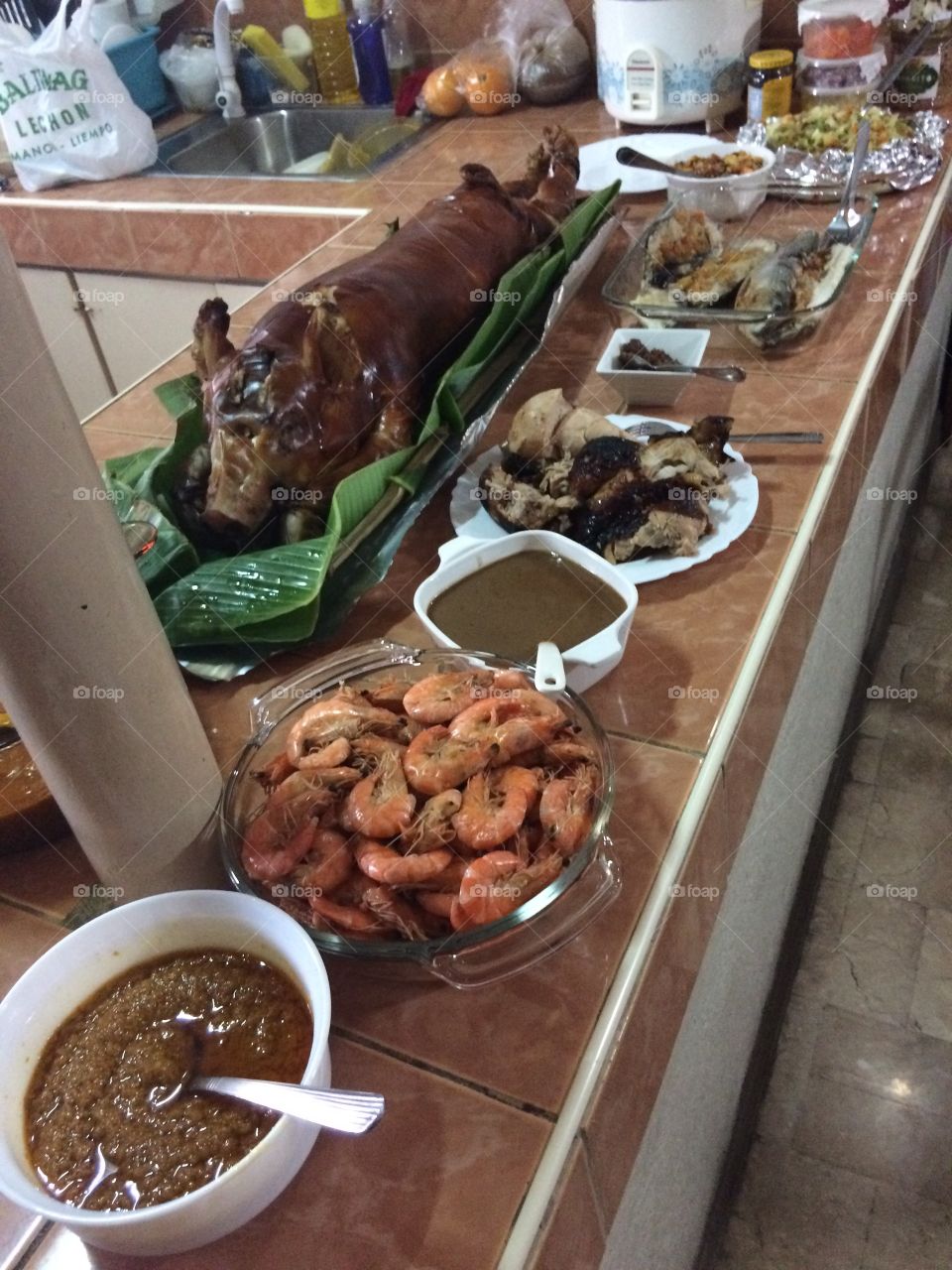 normally during celebrations food like steamed shrimp, fried chicken and roasted pig are served together with beer and wine.