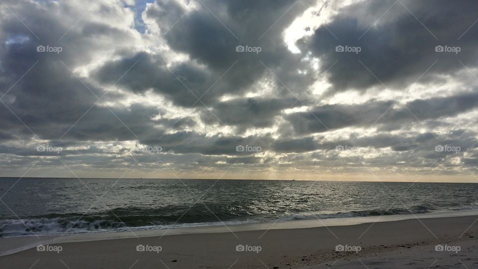 dramatic sky over beach