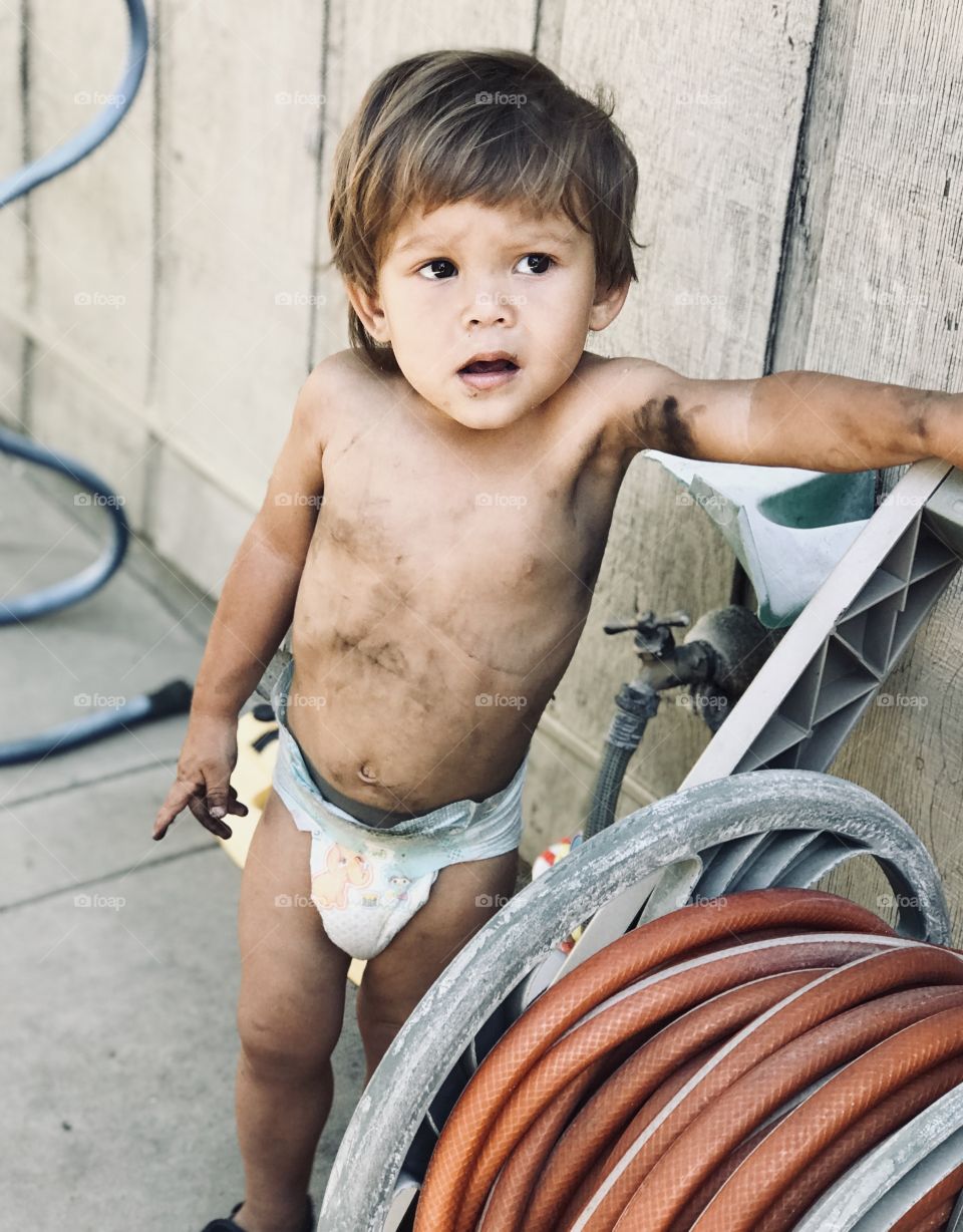 Andrew was playing in the backyard 