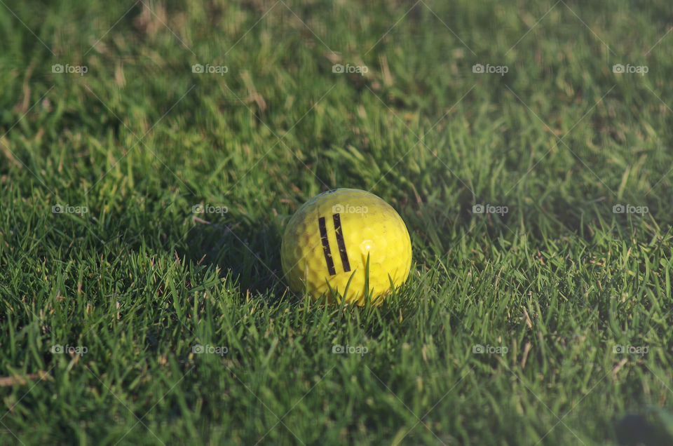yellow golf ball