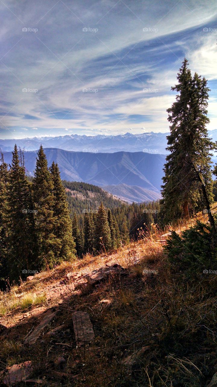 Beautiful vista of mountains and the valleys below .