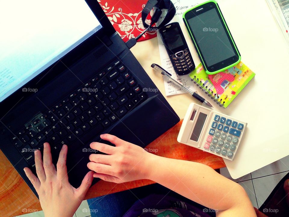 person working on a laptop computer