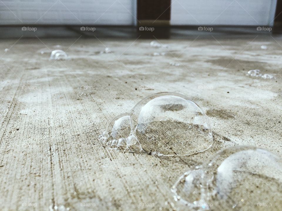 Soap bubble on floor
