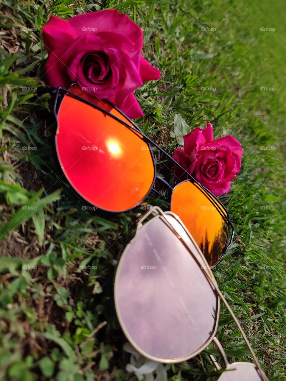 Sunglasses with sky reflection,