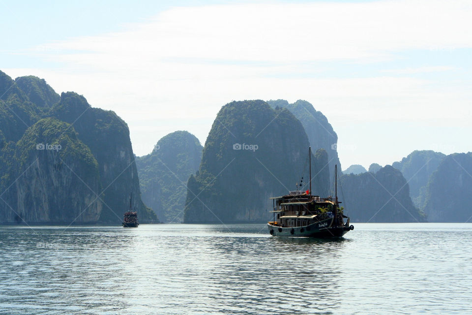 ocean sky boat mountains by mengzishiliu