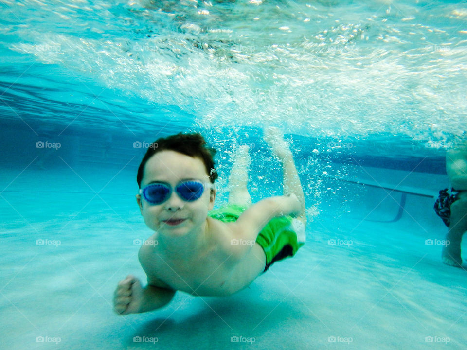 Boy swimming in underwater