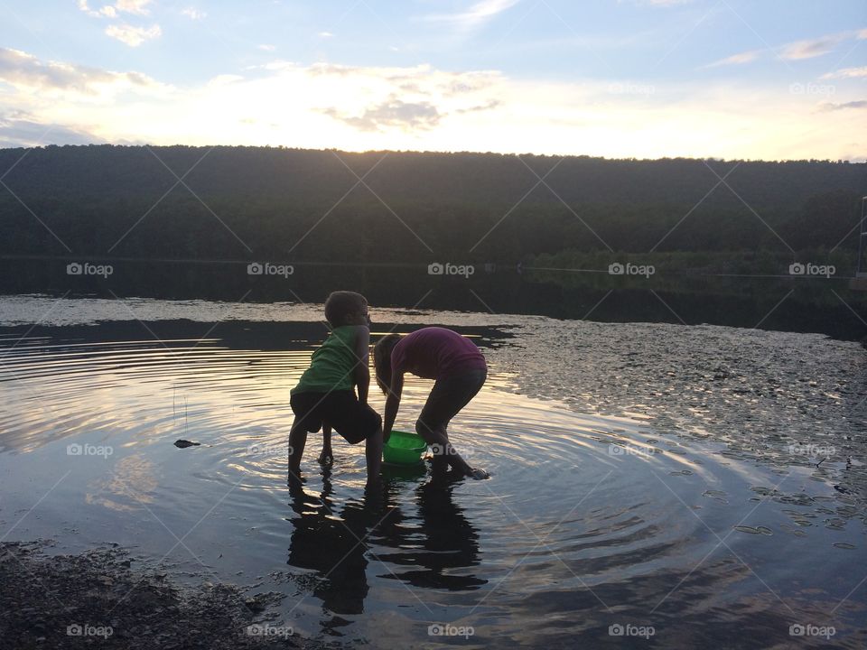 Lakeside Summer. My kids were playing in the lake as the sun set behind them. A perfect summer day!