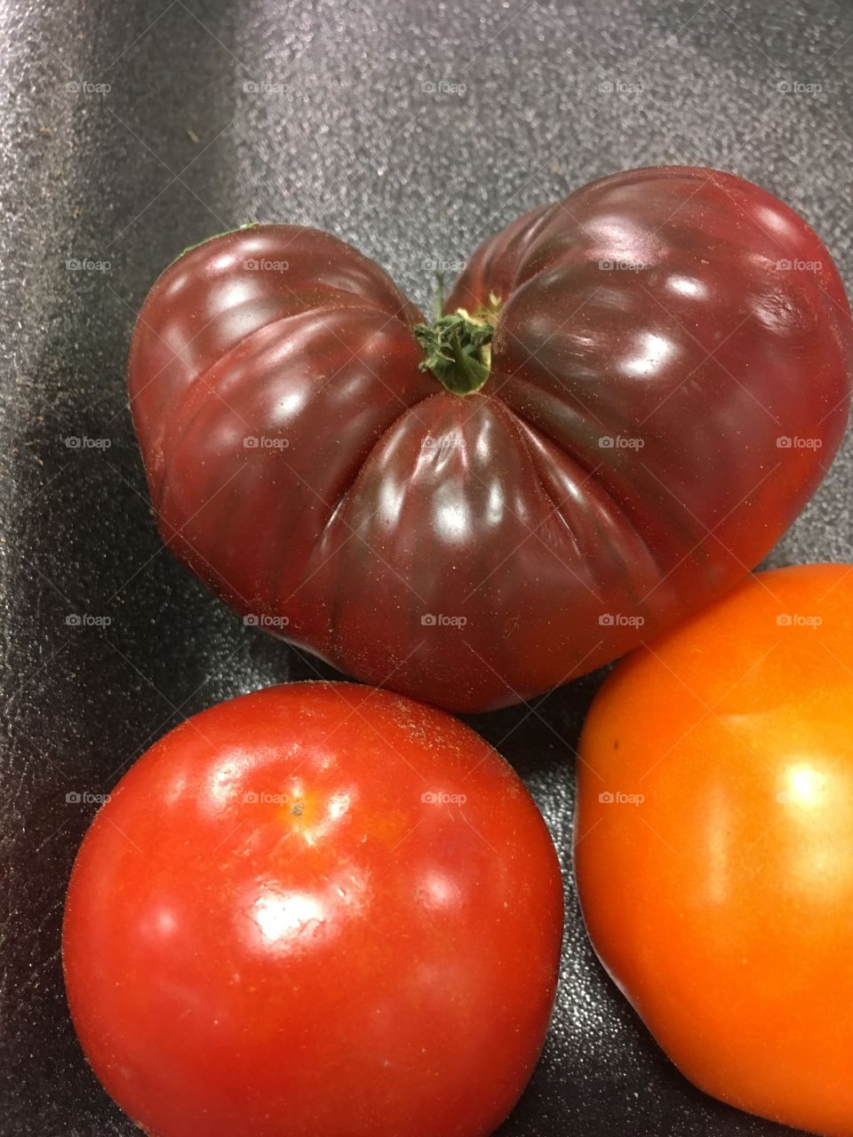 Tomatoes at Publix dark one looks like a heart ❤️