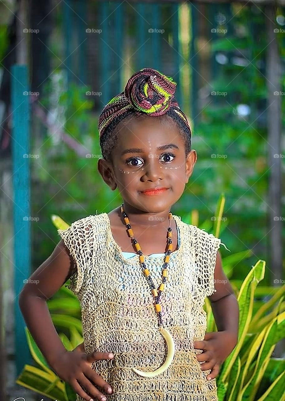 little princess in traditional Papuan clothing.