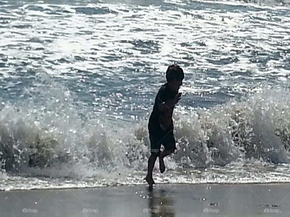 playing with the waves
