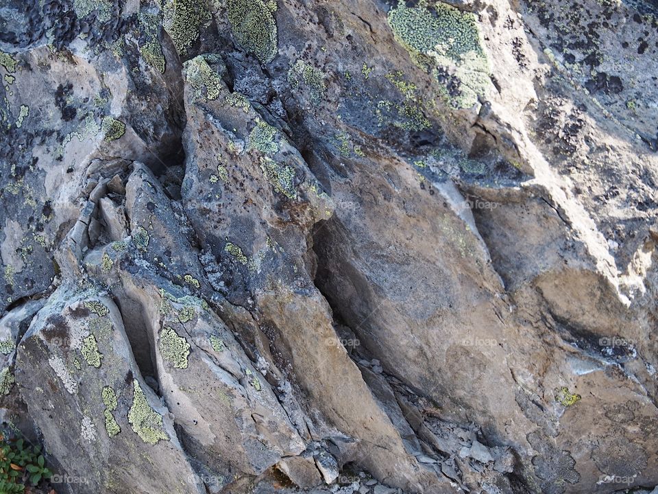 The rugged terrain of the jagged rocks at the Big Obsidian Flow in the Newberry National Volcanic Monument in Central Oregon in the fall. 