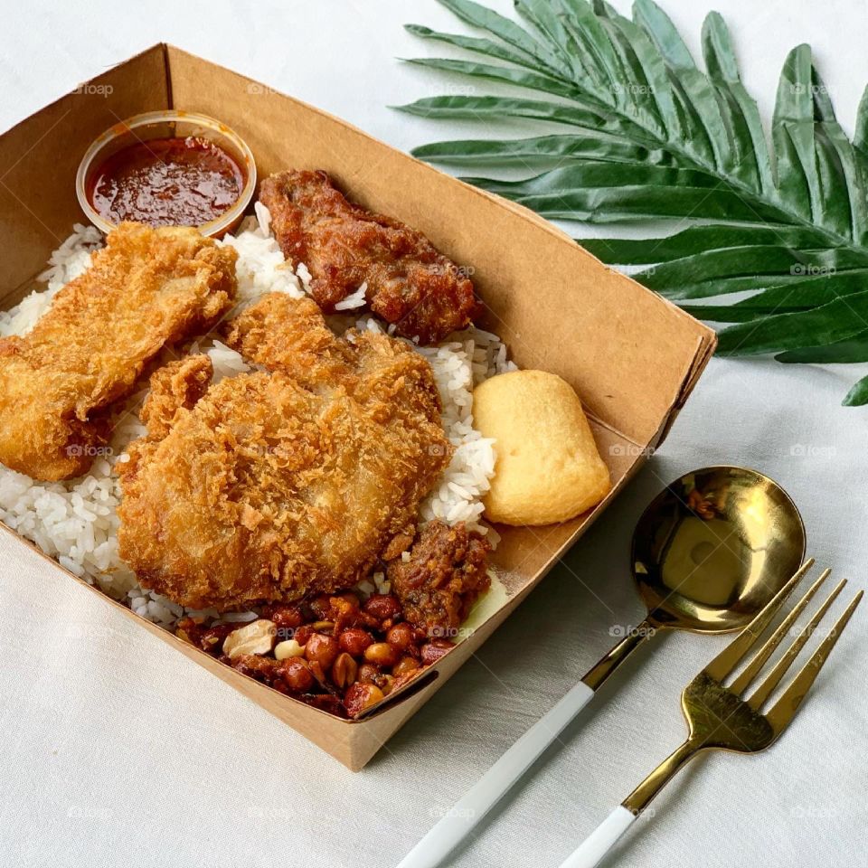 Authentic Nasi lemak asian food with barley drink 