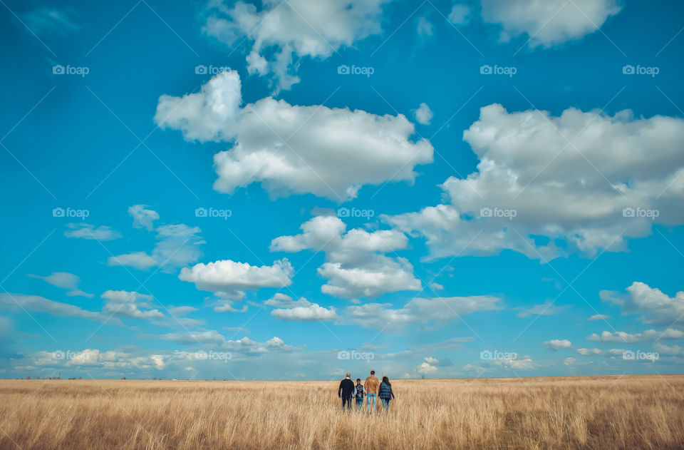 a family of four leave for the steppe