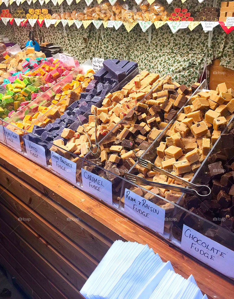 Just look at all that fudge, such amazing colours and each one a different flavour. Traditional market atmosphere caught on camera in a modern day culture. 