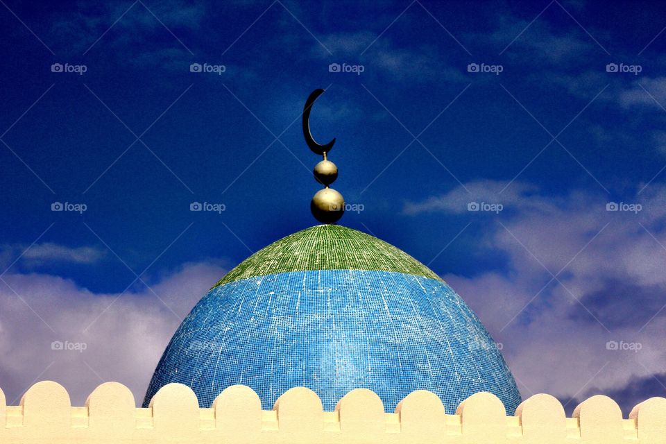 Mosque against blue sky