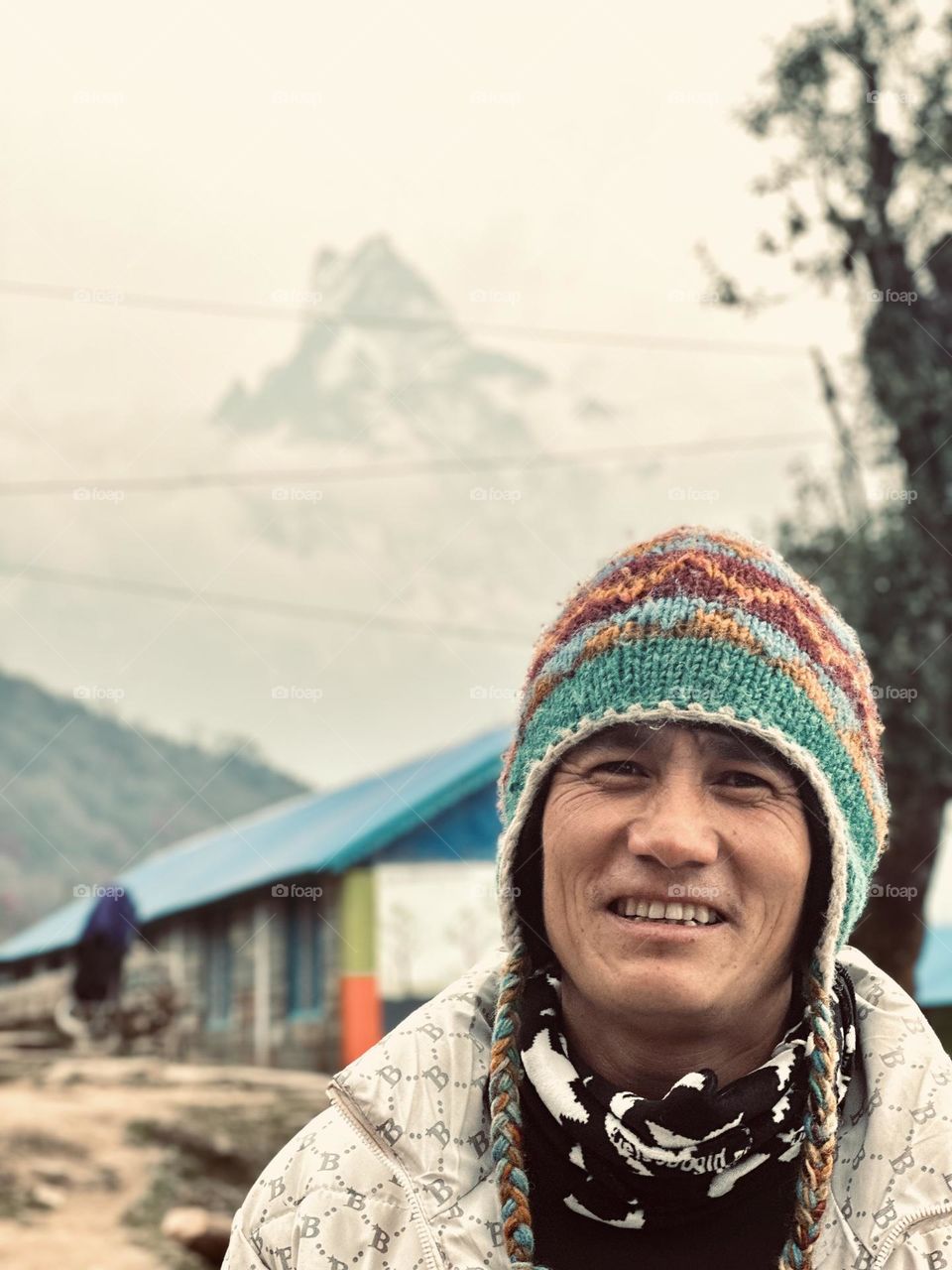 People from the Himalaya - on the back Fish Tail mountain, the holy and unclimbed mountain of Nepal