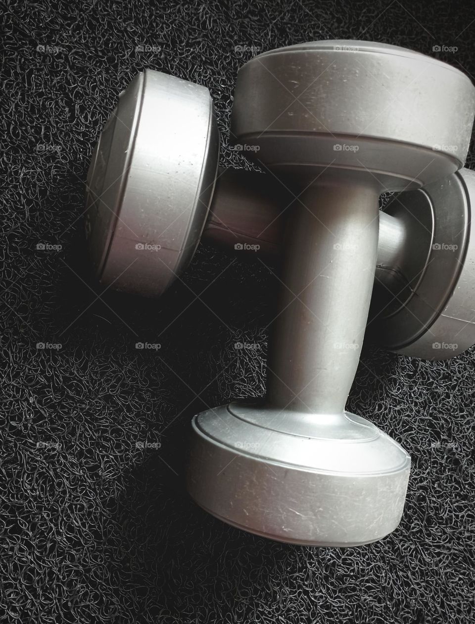 Dumbbells in a black background...