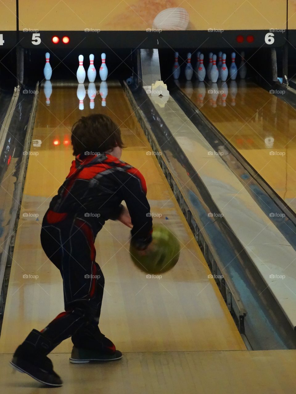 Boy In Bowling Alley
