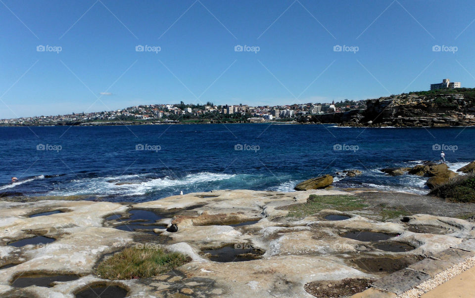 Bondi beach waves. Rocky beach 