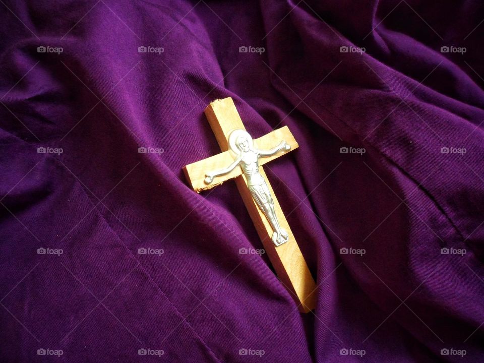 orthodox cross on purple background