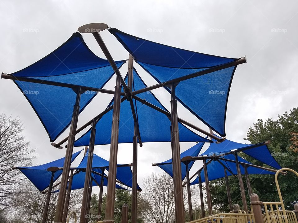 Children playgrounds are enhanced with canvas covers