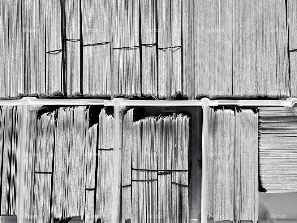 Top view of many playing cards bundled into blocks