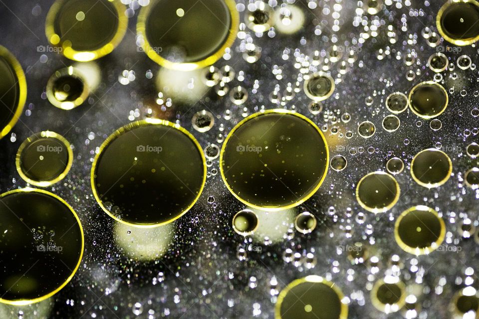 Golden oil Bubbles Close Up background amazing colours droplets of life in black texture macro look summer mood positive vibes wonderful day hustling daydreaming