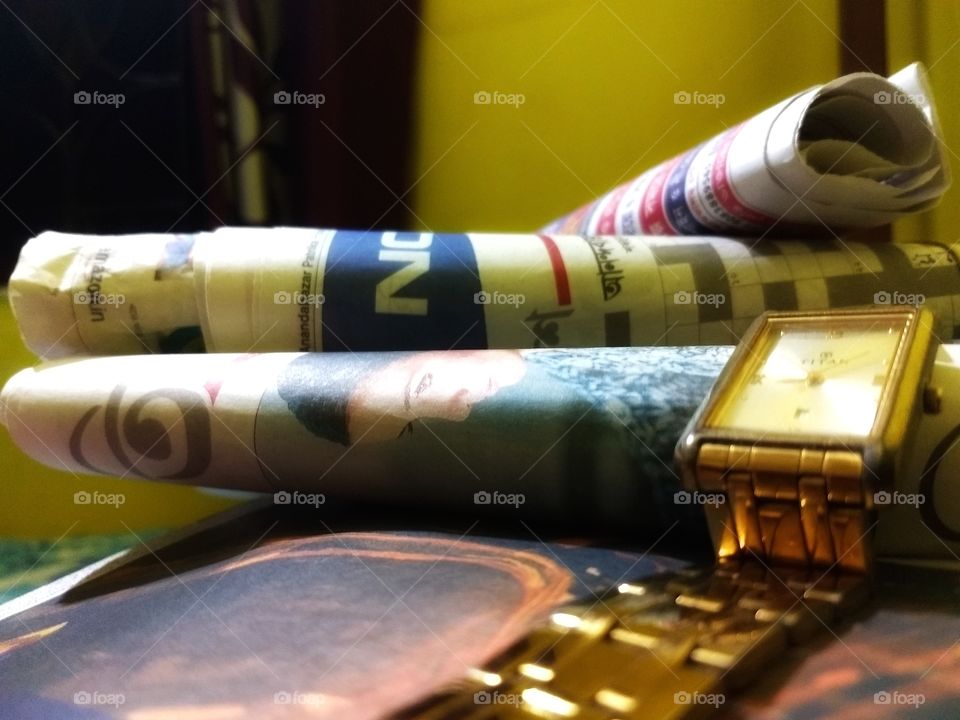 Newspapers & writch watch....