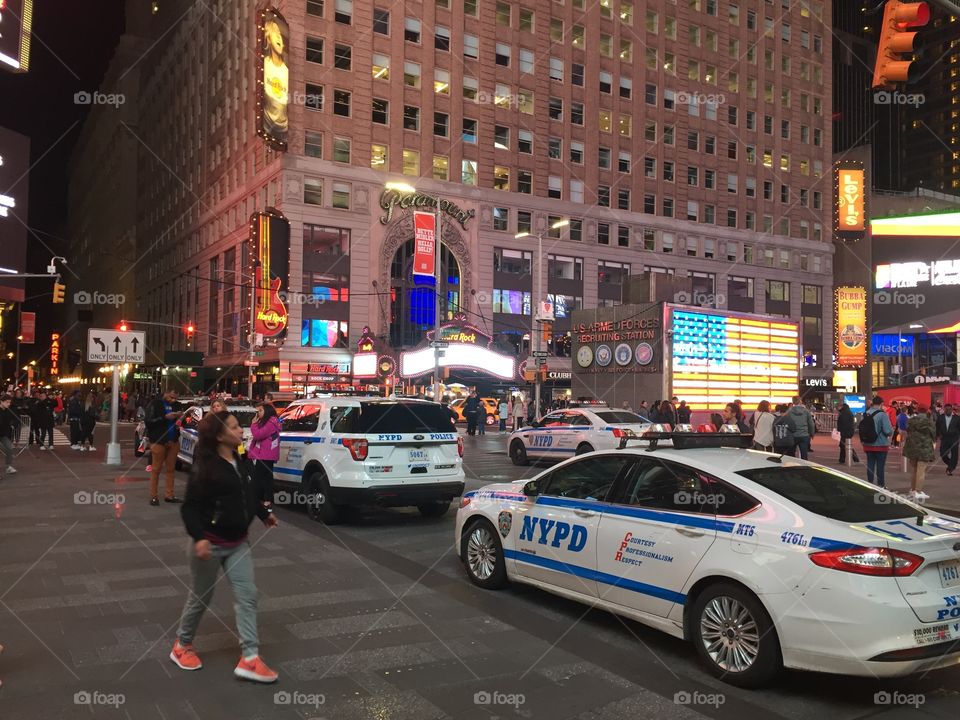 An action shot of the busy nightlife in Times Square.