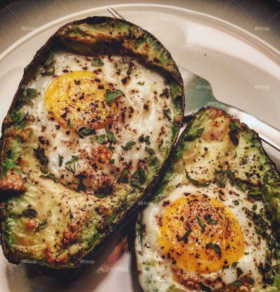 Egg baked in avocado... A simple and delicious side or snack. Google search for the recipe!