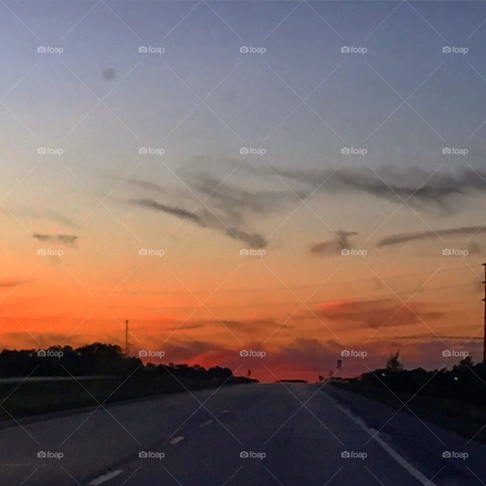 Empty road during sunset