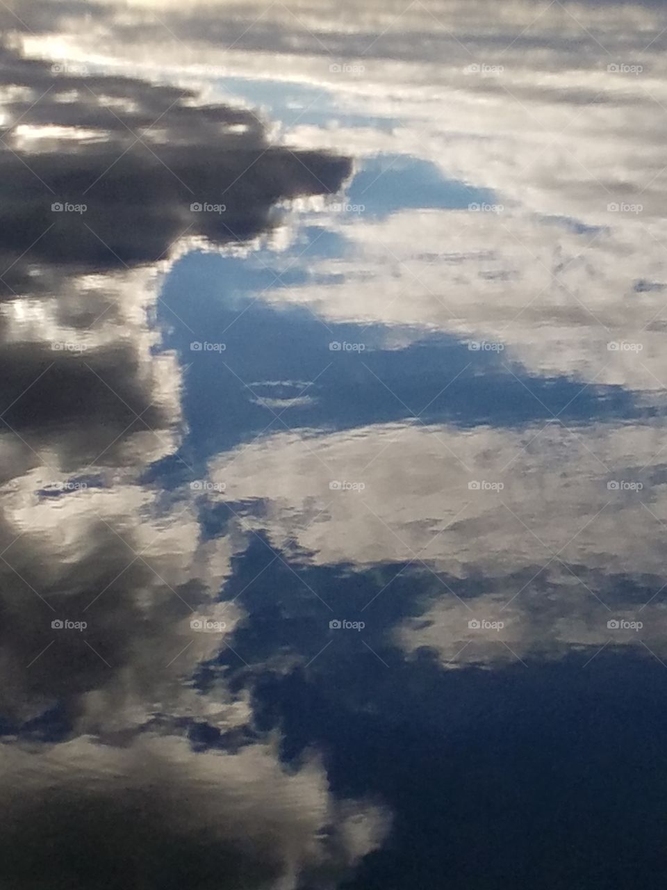 reflecting the sky on the water