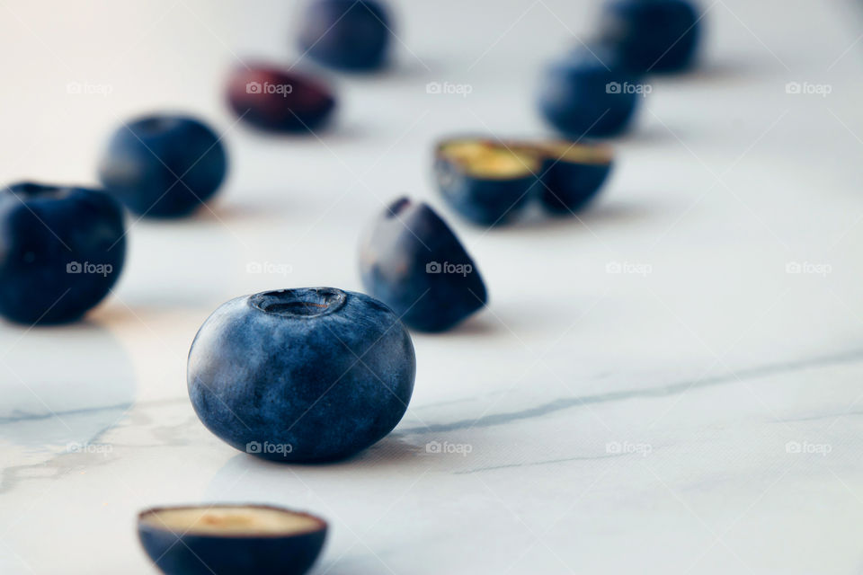 Fresh organic blueberries on a marble background 