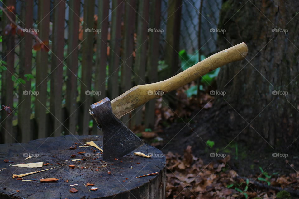 Ax.  Village.  Chop wood.  Country life.