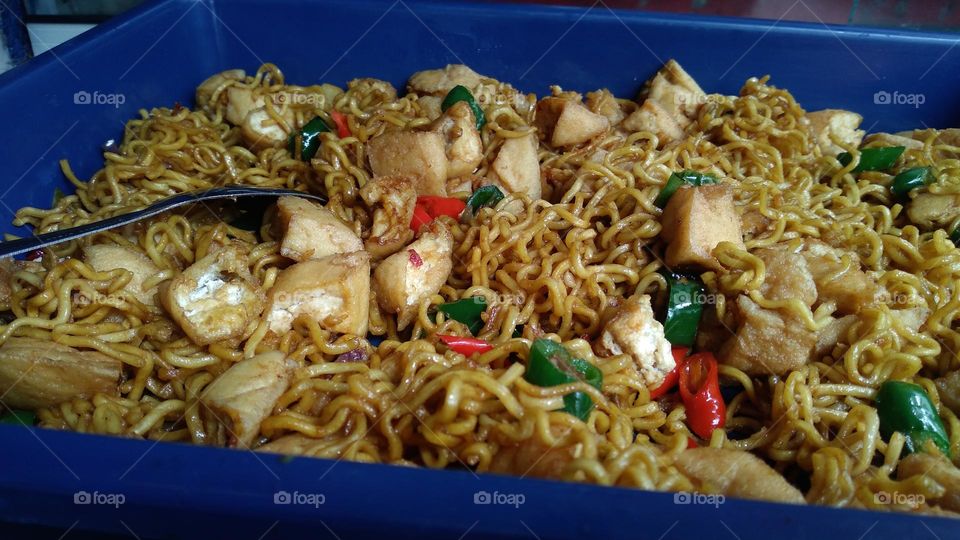 Tofu noodle dishes that are ready to be served or eaten