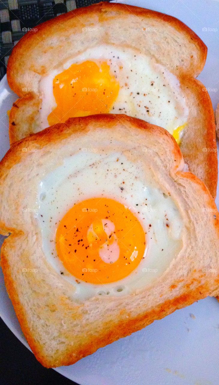 Sunny side eggs in toast 🍳