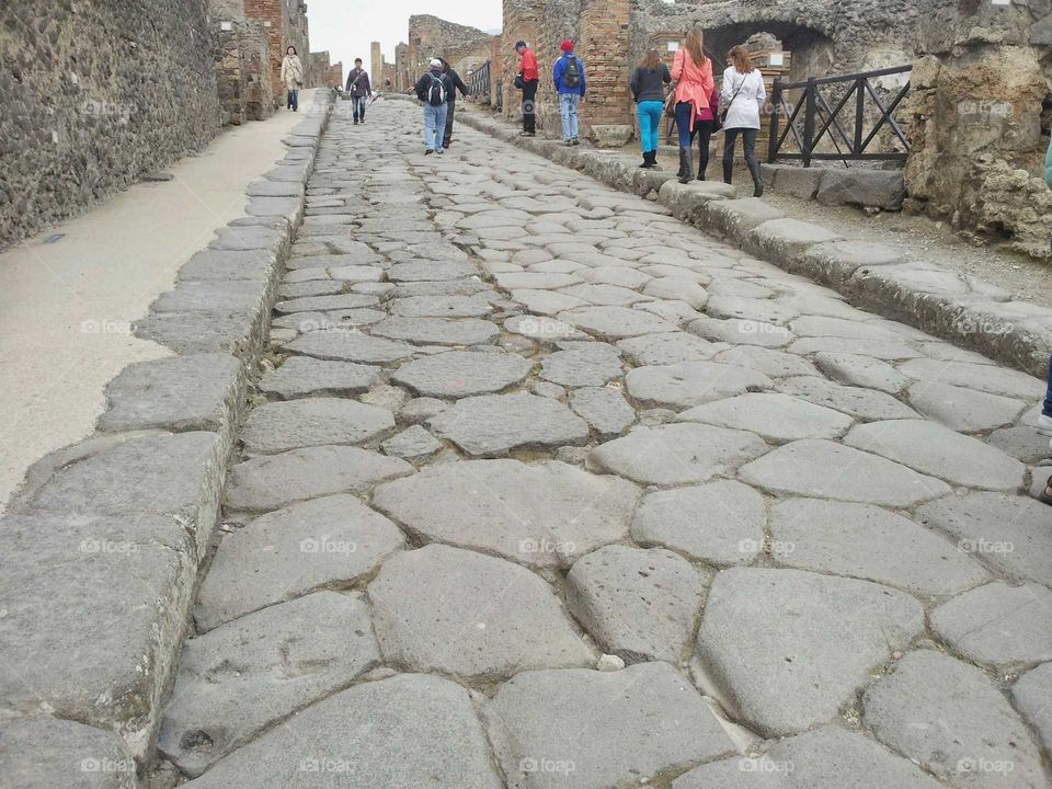 An ancient Roman road through Pompeii.